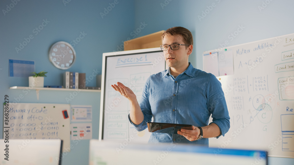 School Class: Portrait of the Enthusiastic and Motivated Teacher Using Digital Tablet Computer, Expl