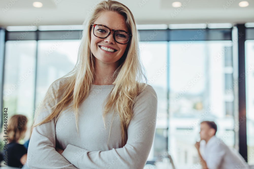 Portrait of confident businesswoman in boardroom