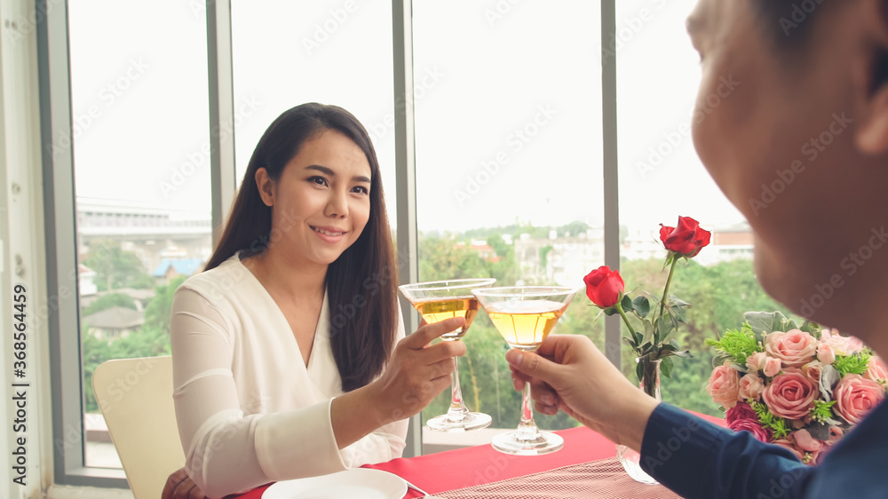 Happy romantic couple eating lunch at restaurant . Couple anniversary celebration and lifestyle .