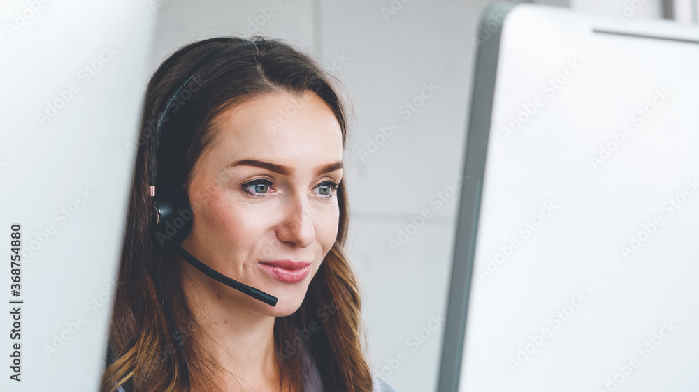 Business people wearing headset working in office to support remote customer or colleague. Call cent