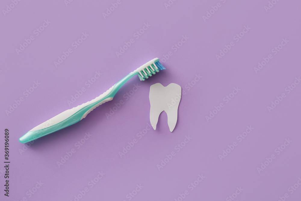 Tooth brush on color background