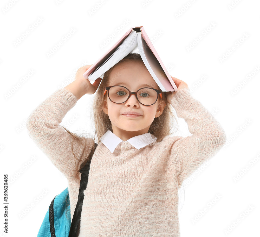 Cute little schoolgirl on white background