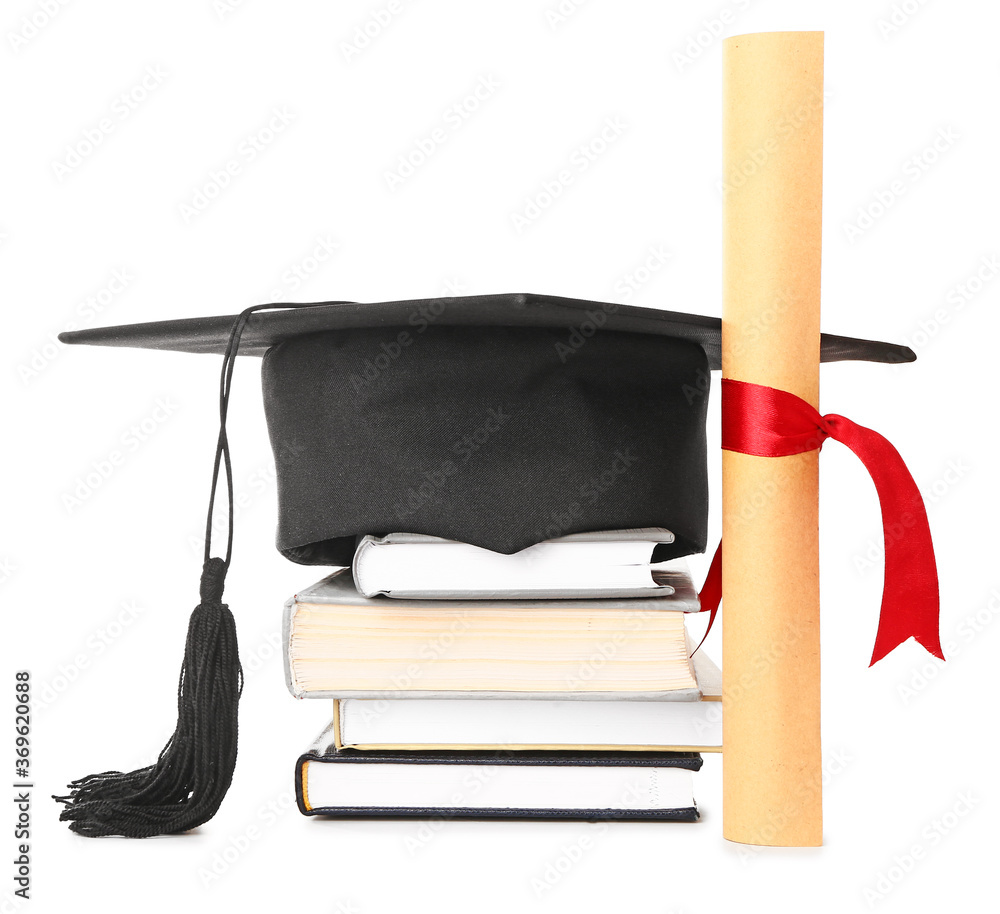 Graduation hat, books and diploma on white background