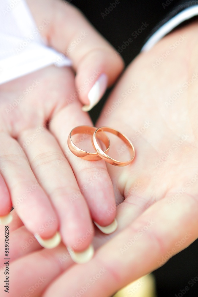 Groom and Bride Showing Wedding Rings