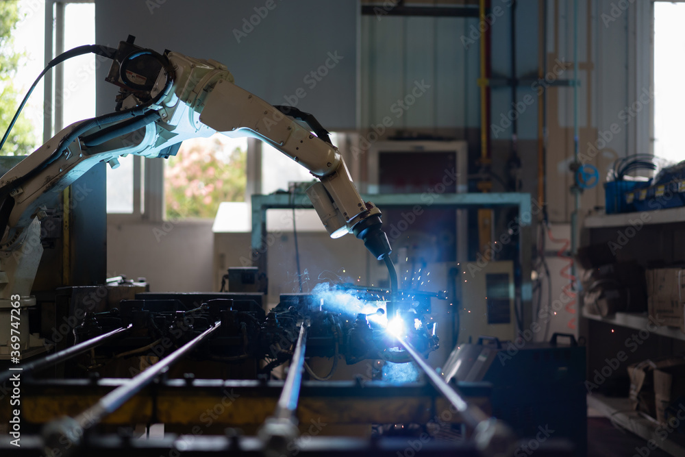 robot arm working in factory