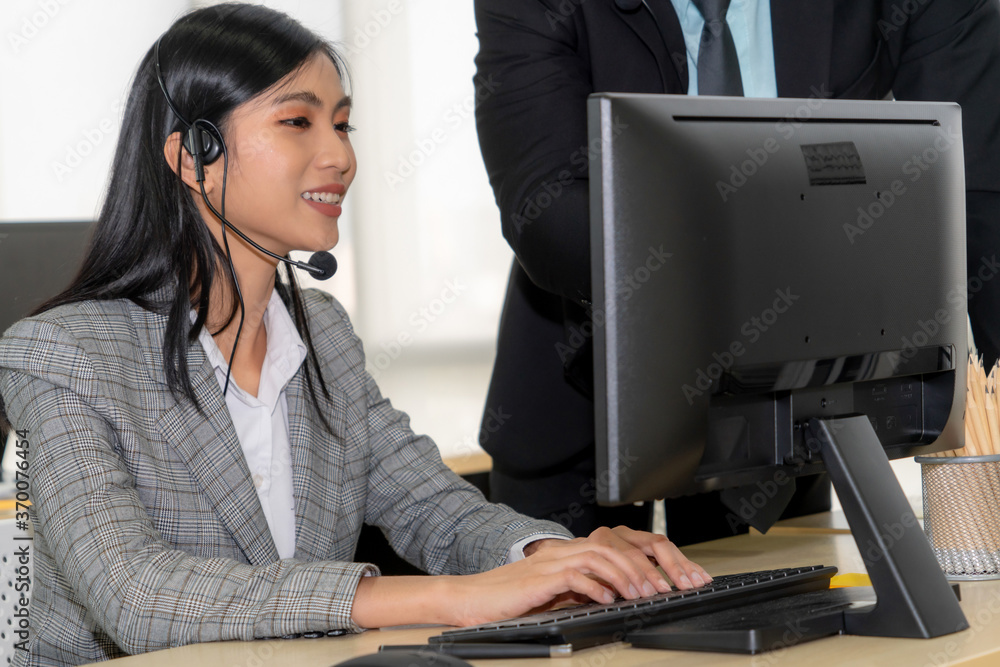 Business people wearing headset working in office to support remote customer or colleague. Call cent