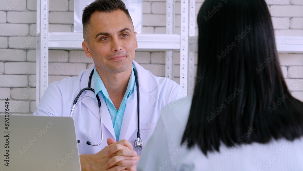 Doctor in professional uniform examining patient at hospital or medical clinic. Health care , medica