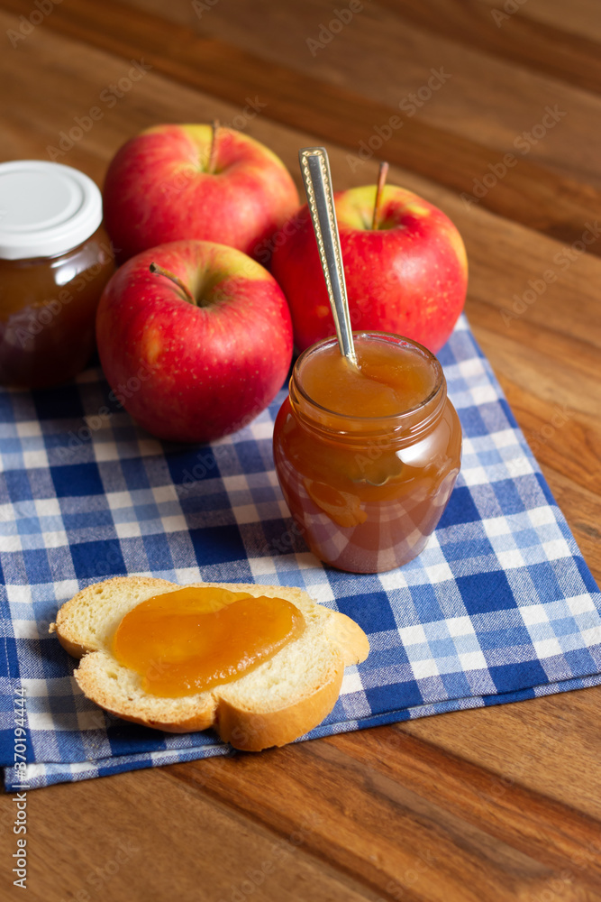 Homemade apple jam. Slice of bread with jam on top.