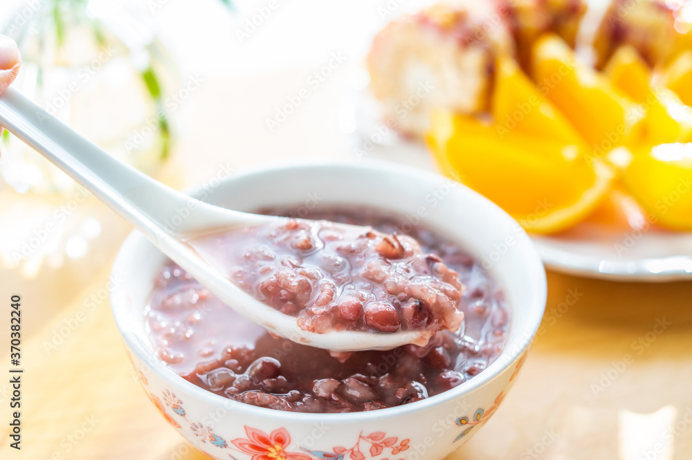 Chinese nutritious breakfast with red bean porridge and corn