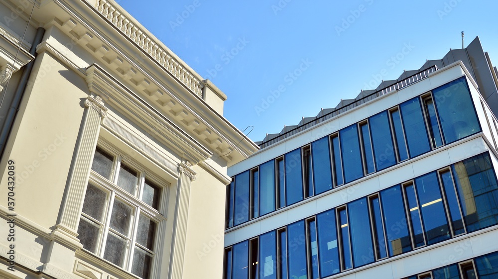 Panoramic and perspective wide angle view to steel blue background of glass. Business concept of suc