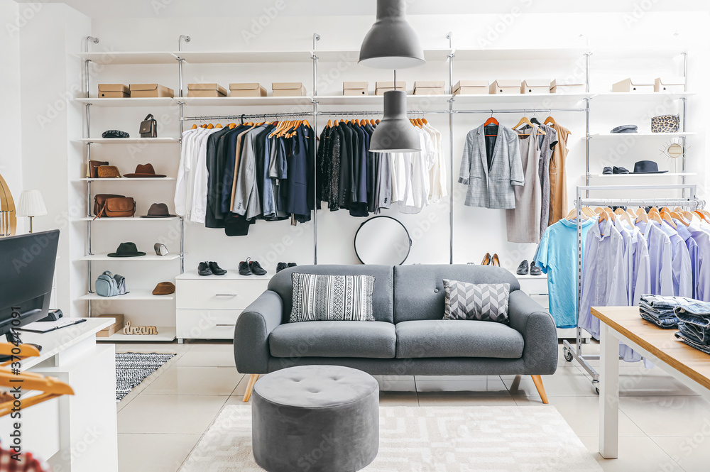 Stylish interior of modern clothes store