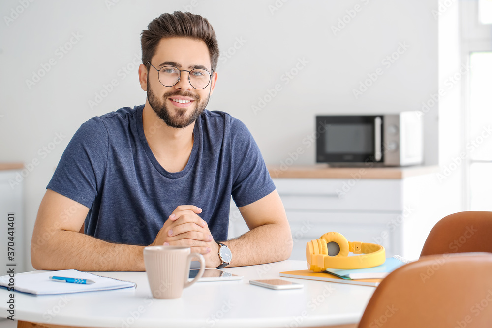 Young man learning at home