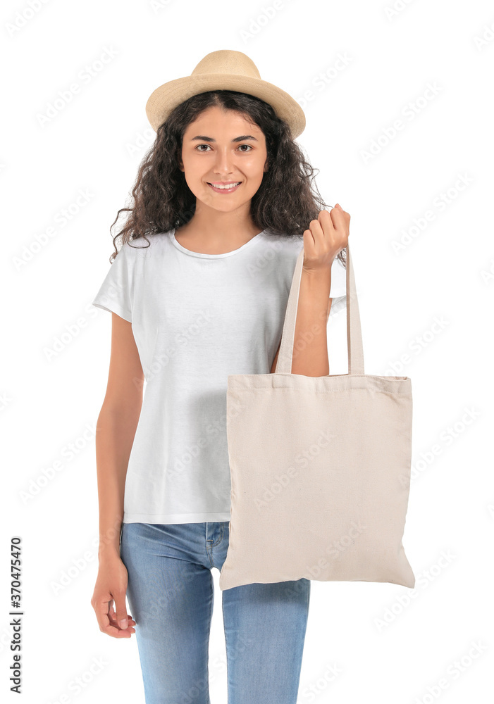 Beautiful young woman with eco bag on white background