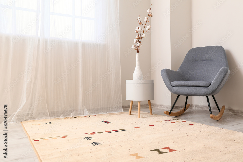 Interior of modern room with soft carpet