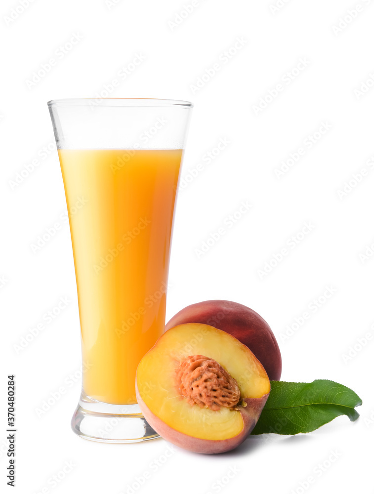 Glass of tasty peach juice on white background