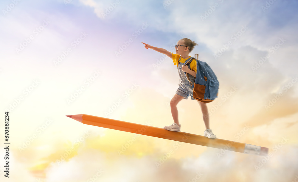 child flying on a pencil