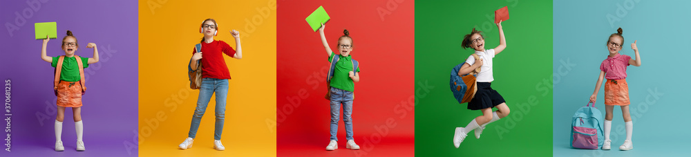 Kids with backpacks on colorful background