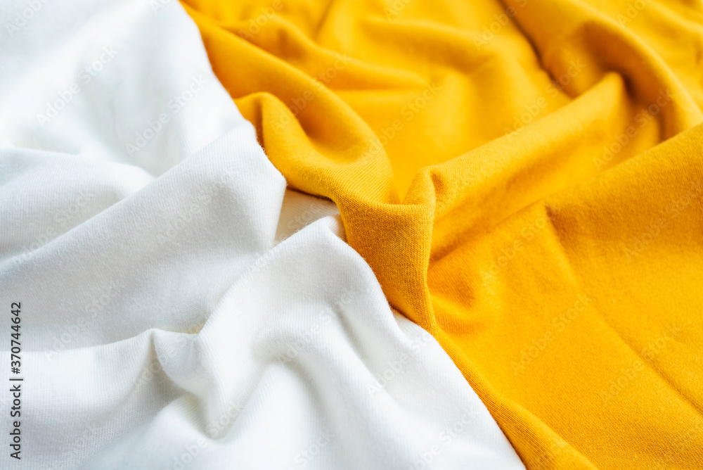 Yellow and white cotton knitted fabric texture