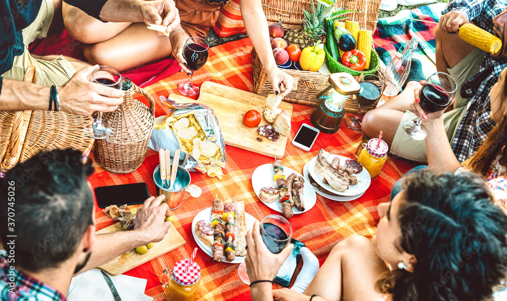 Friends having fun at bar-b-q pic nic party - Happy people millenial camping at open air picnic - Yo