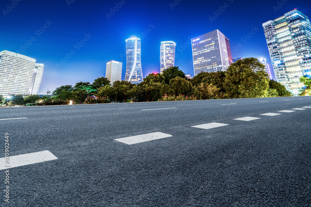 city road through modern buildings in China