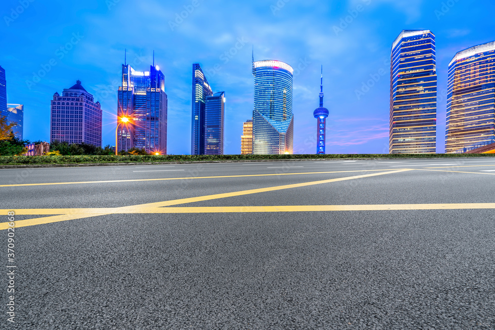 city road through modern buildings in China