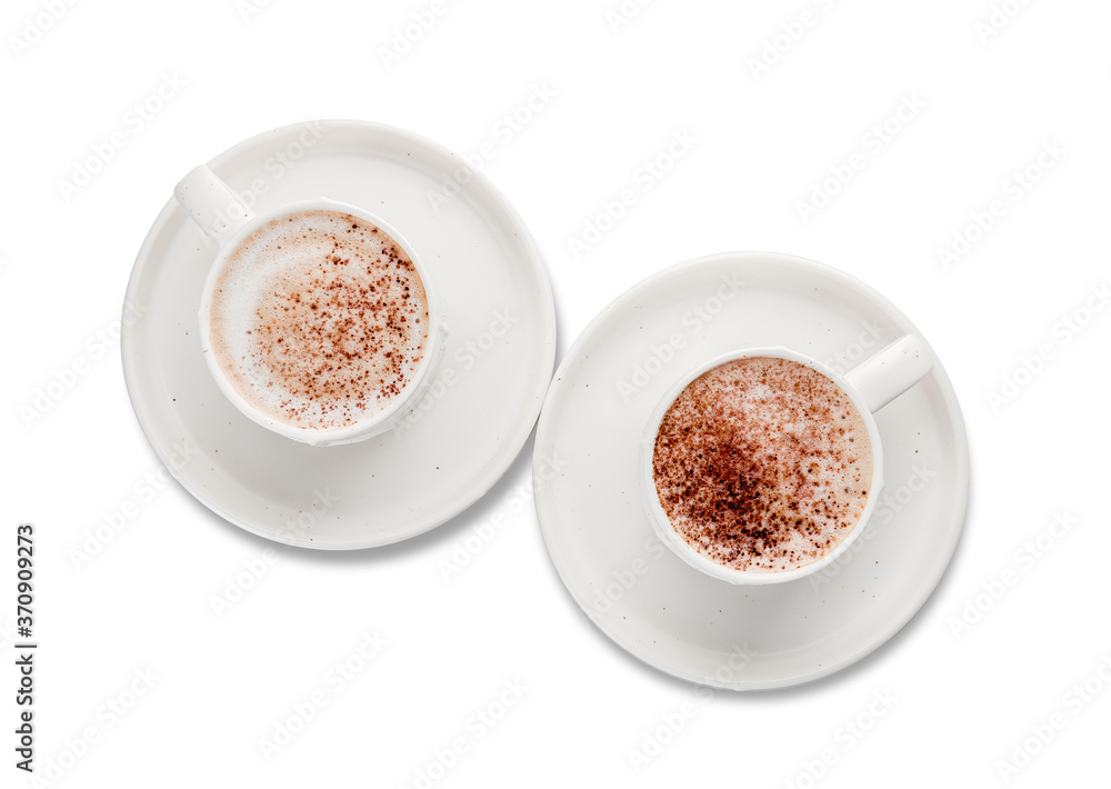 Cups of hot coffee on white background