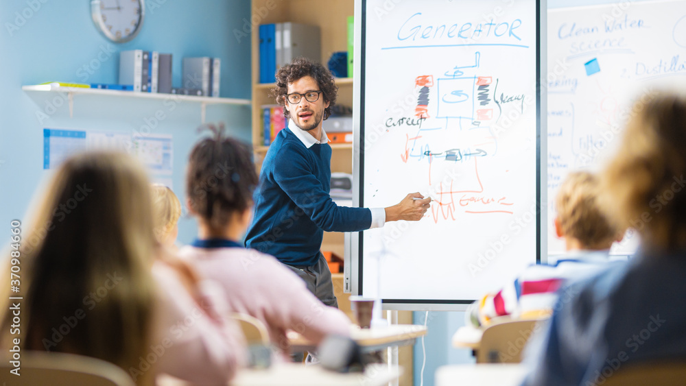 Elementary School Physics Teacher Uses Interactive Digital Whiteboard to Show to a Classroom full of