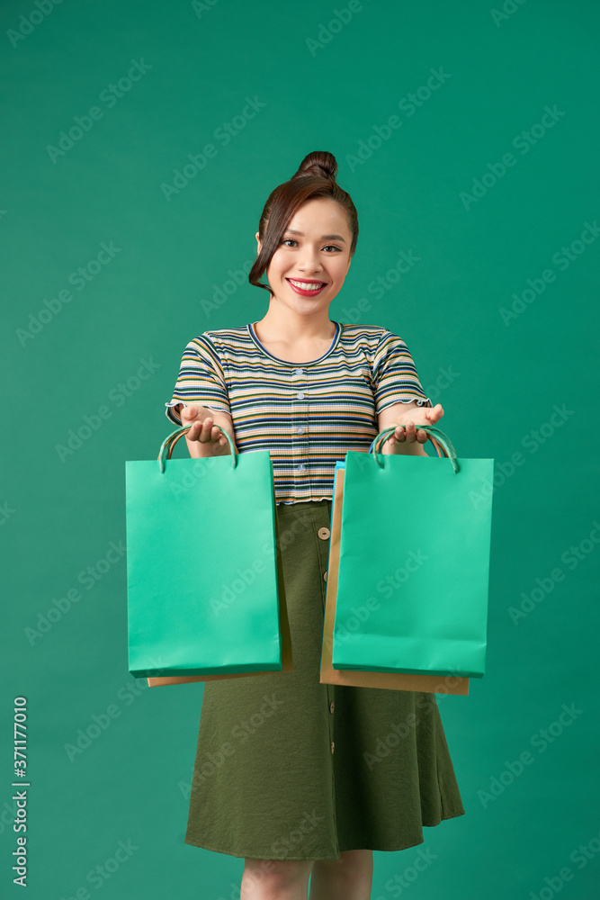 Portrait beautiful young asian woman happy smile with a lot of color shopping bag from department st