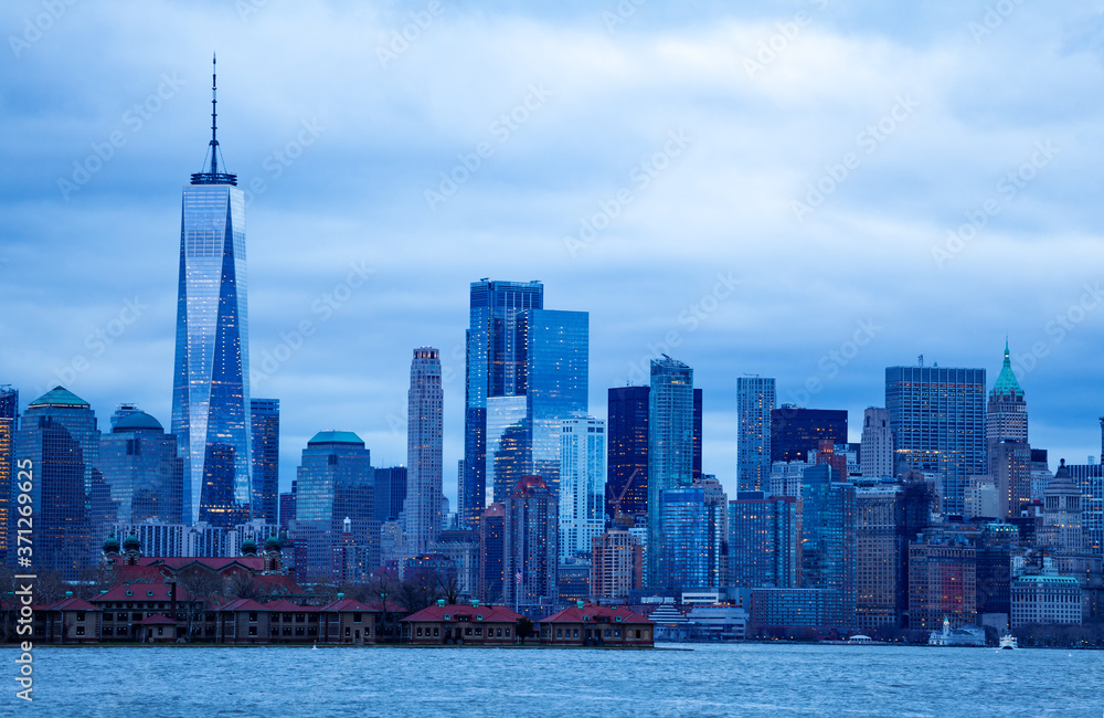 Panorama of New York Manhattan downtown over Hudson river on moody overcast evening