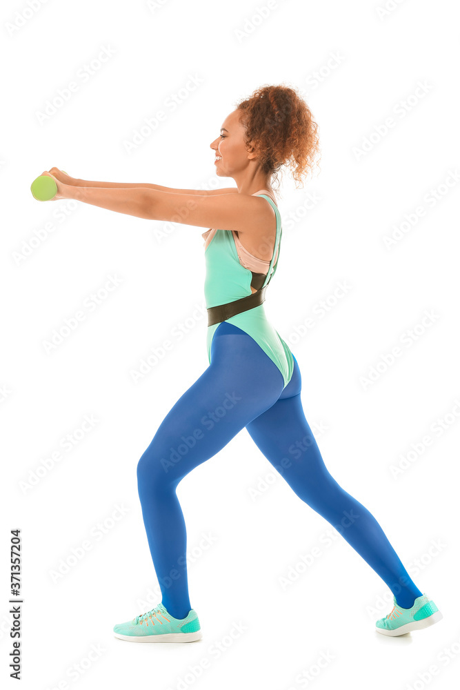 Young woman doing aerobics on white background