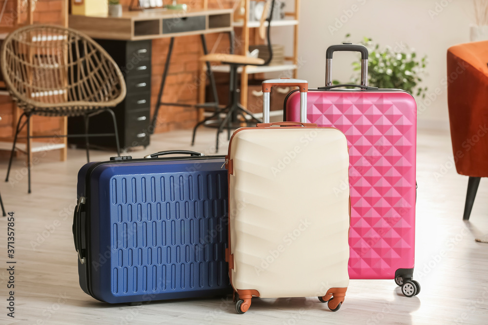 Packed suitcases at home. Travel concept