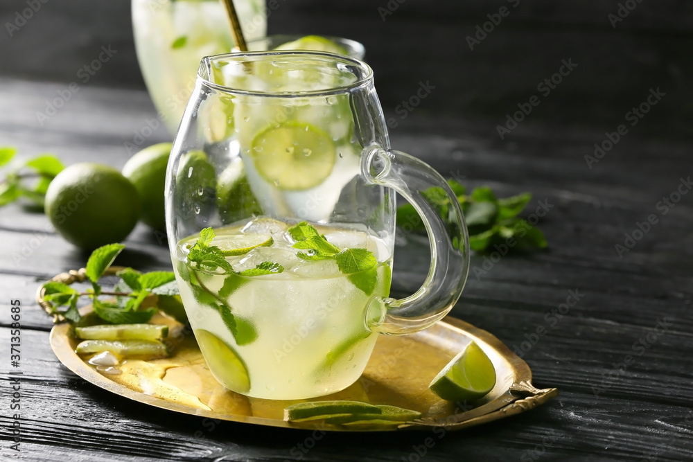 Glassware of fresh mojito on table