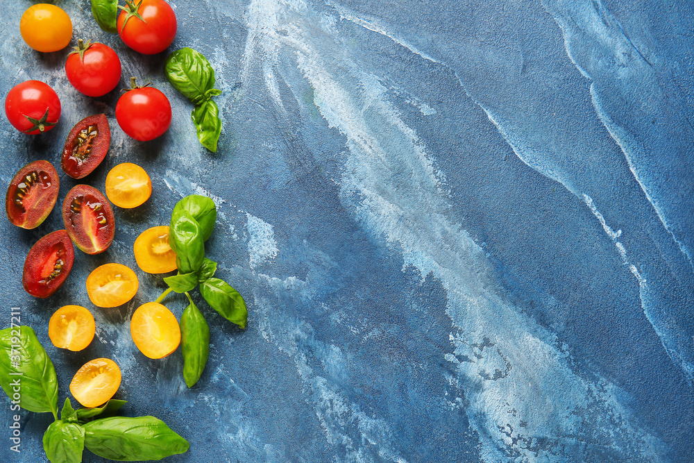 Fresh cherry tomatoes on color background