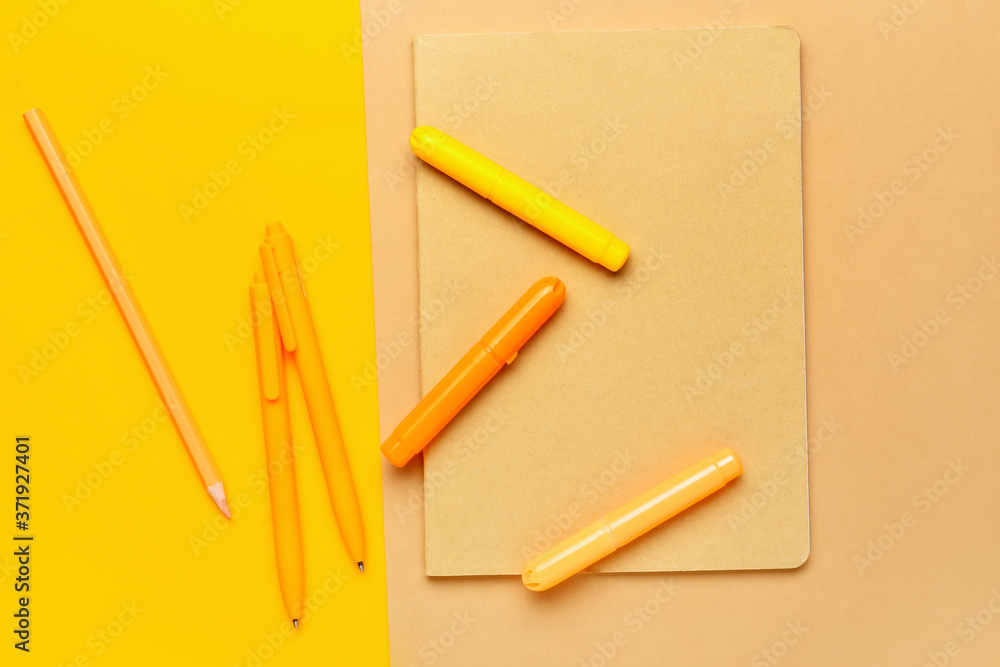 Set of school stationery on color background