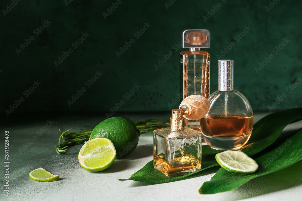 Bottles of citrus perfumes on table