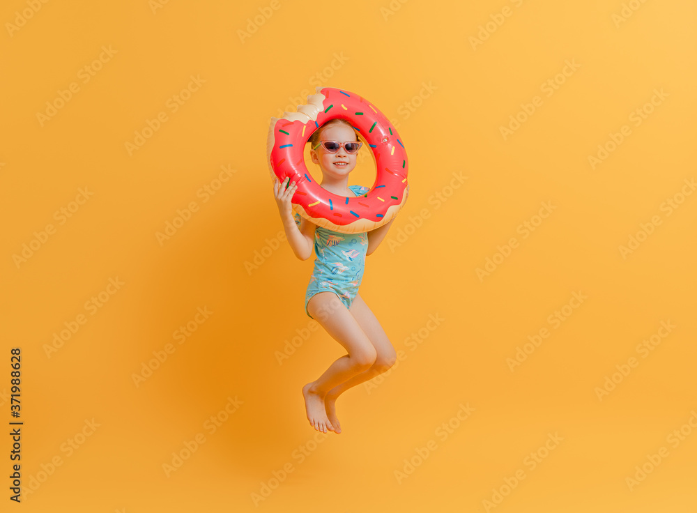 Happy child wearing swimsuit