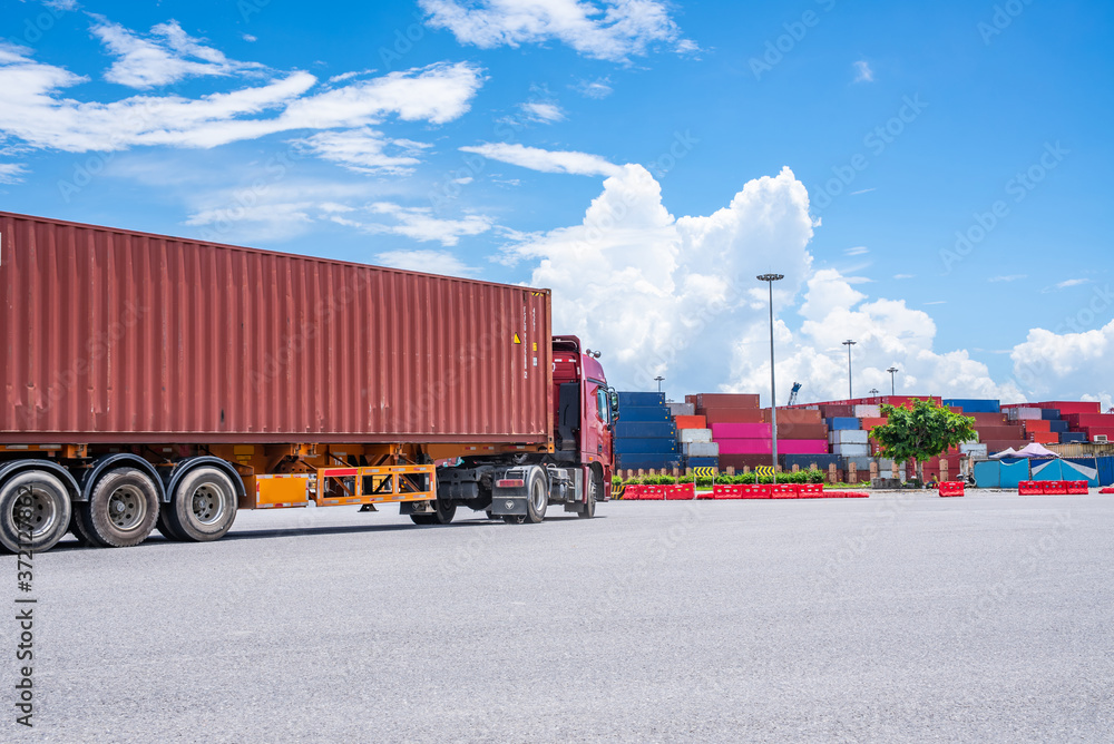 Busy container transport trailers at Guangzhou Port, China