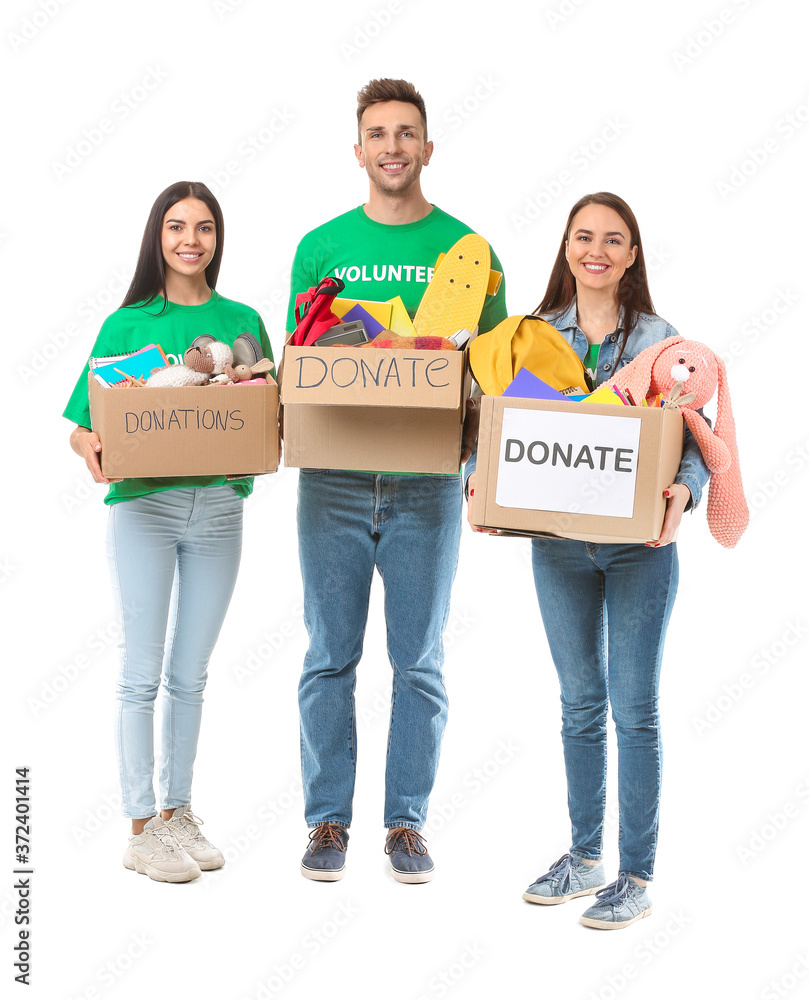 Volunteers with donations for orphans on white background