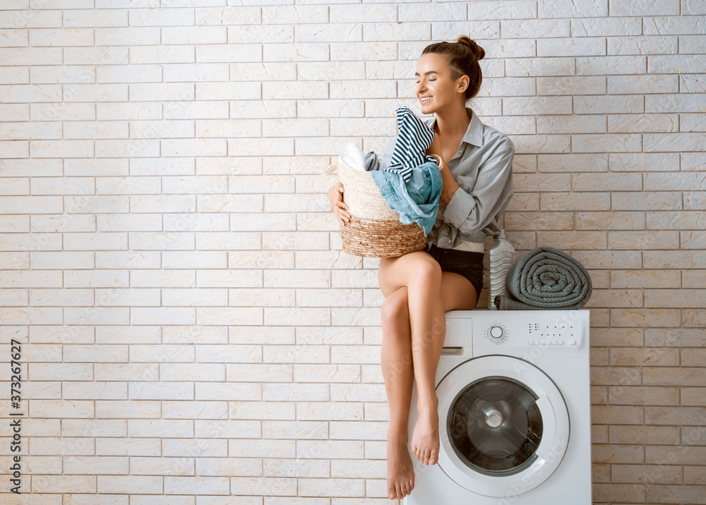 woman is doing laundry