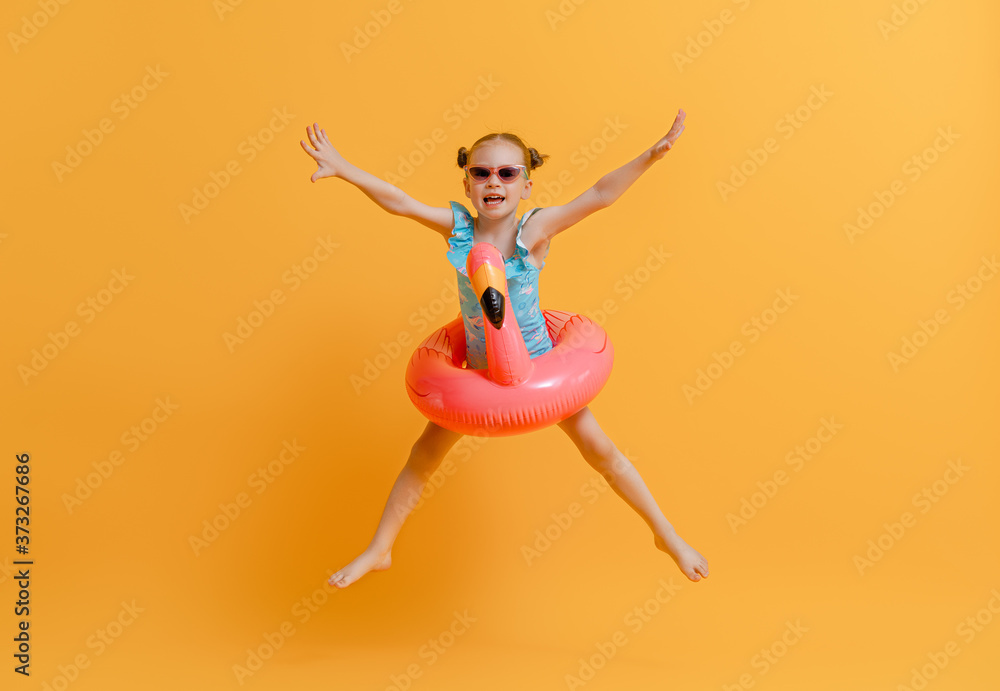 Happy child wearing swimsuit