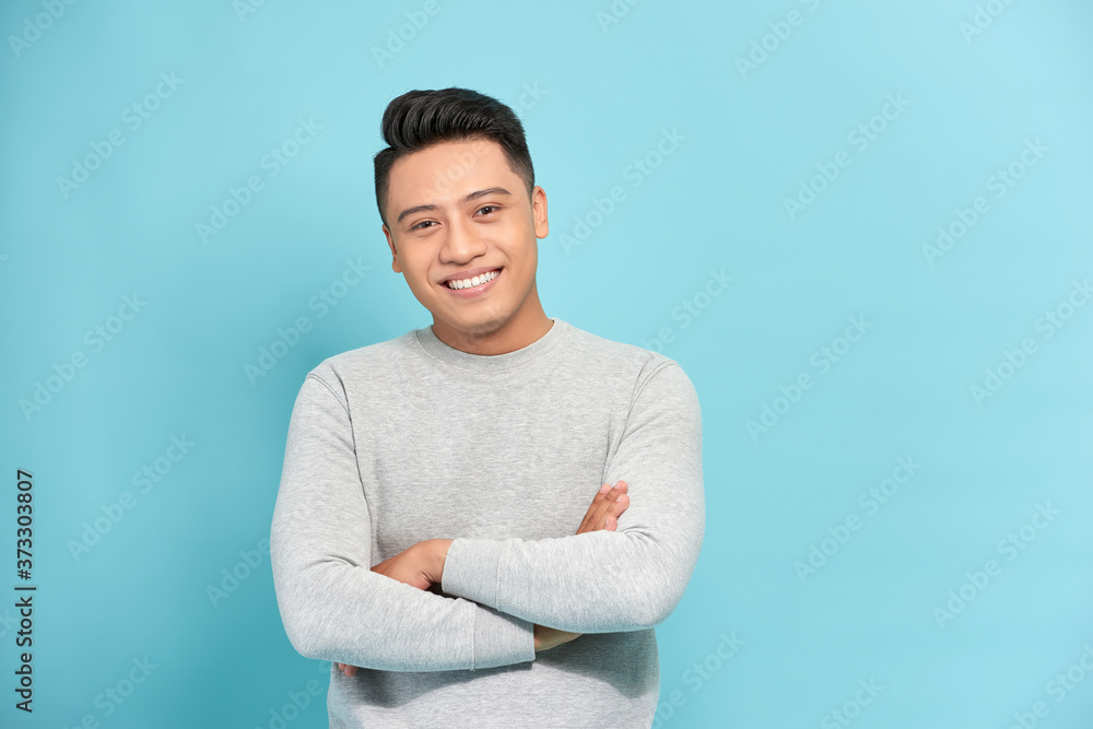 Young Asian man close up shot isolated on white