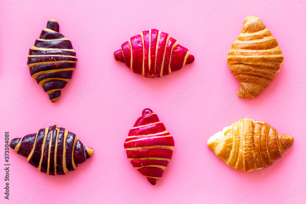 Croissants pattern - set of snacks on pink background