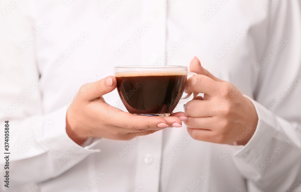 Woman with cup of hot coffee, closeup