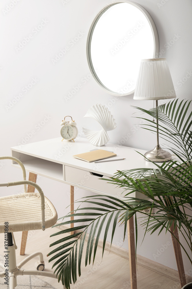 Stylish interior of room with mirror and table