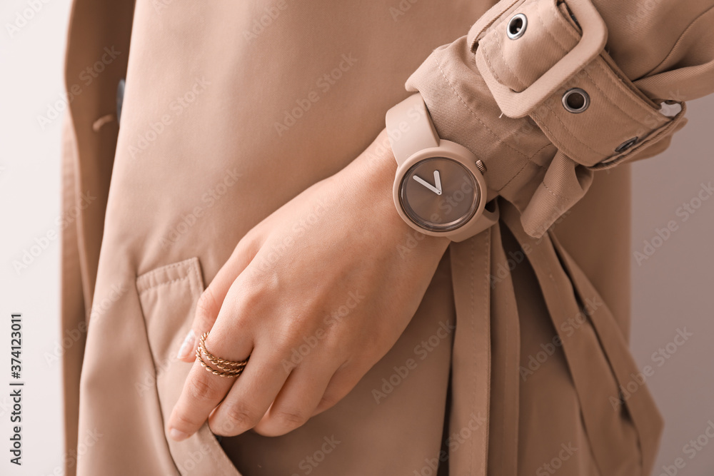 Woman with stylish wrist watch, closeup