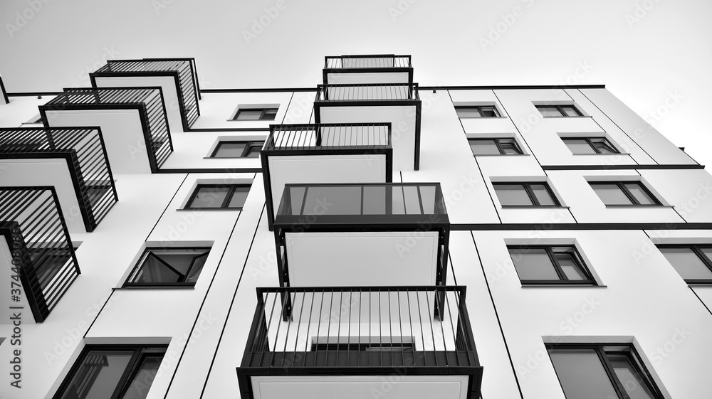 Detail of modern residential flat apartment building exterior. Fragment of new luxury house and home