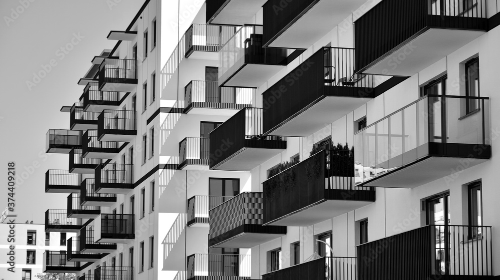 Detail of modern residential flat apartment building exterior. Fragment of new luxury house and home