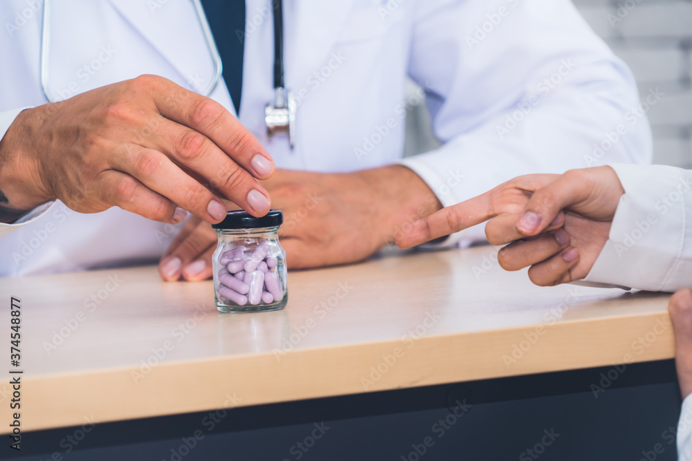 Doctor in professional uniform examining patient at hospital or medical clinic. Health care , medica