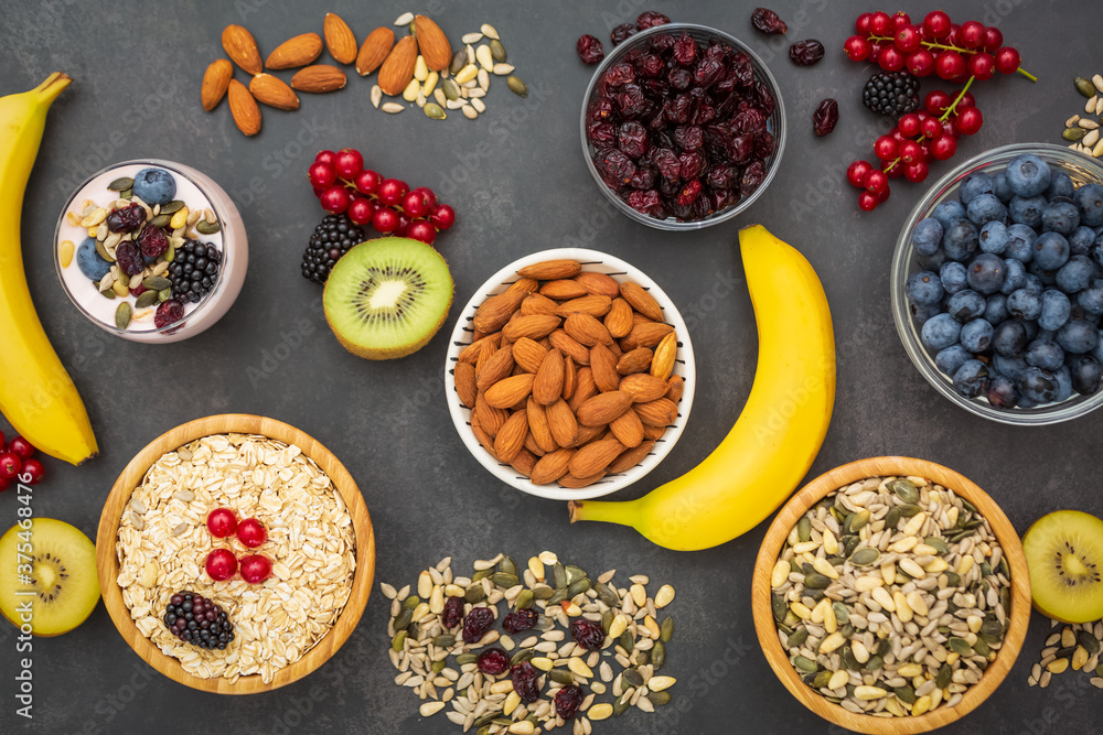 Group Fruits Breakfast with bread Whole grains and nuts, yogurt mix with Cherry , banana, avocado in