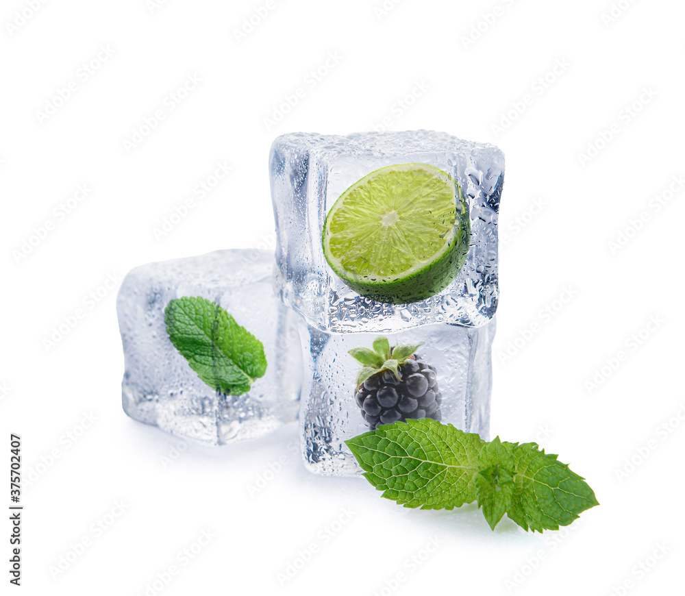 Ice cubes with mint and fruits on white background